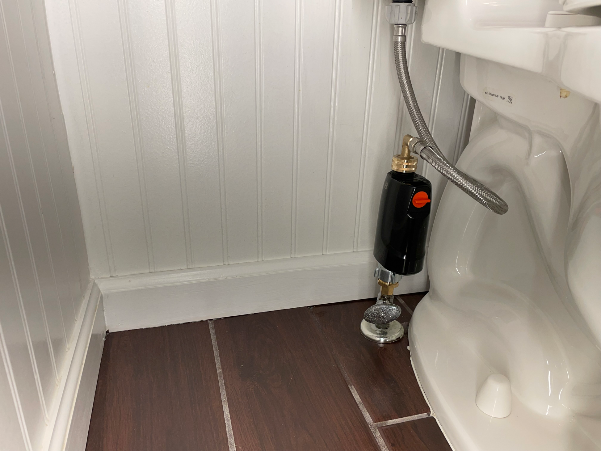 Eltek Group E-WaterBlock water shutoff and flow analytics device. Internal flow meter measures water flow and stores the data. Battery operated device for toilets.