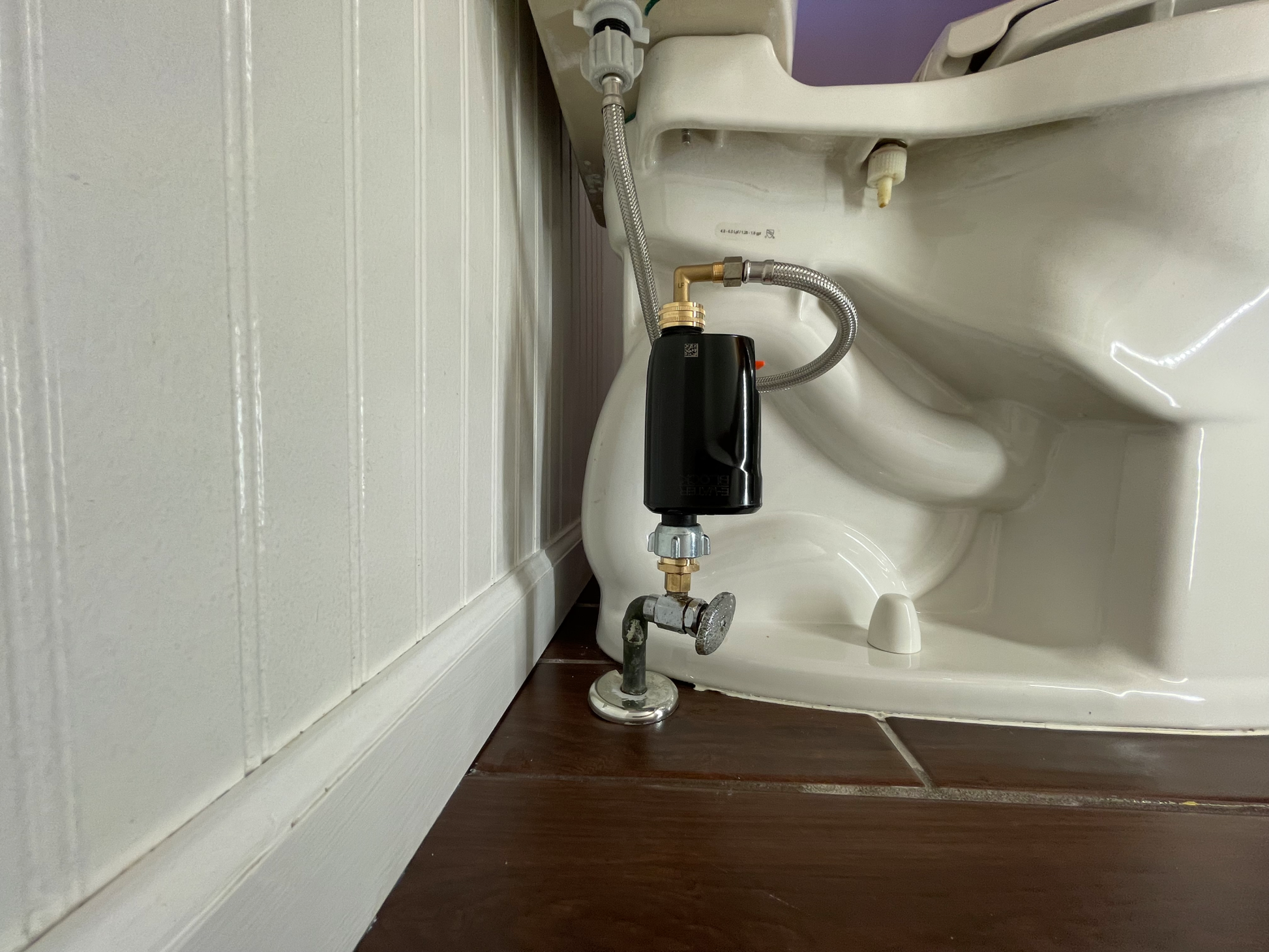 E-WaterBlock smart water shutoff and leak detection tool. Smart technology installed on toilet for property protection.