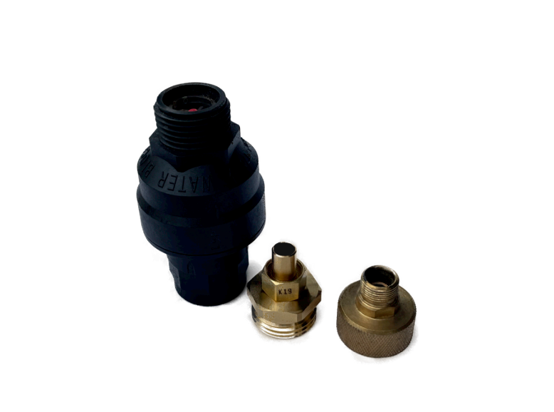 This image shows a water block and 3/8" brass fittings that are used in plumbing applications. The water block is a component of a plumbing system that helps to prevent leaks. The brass fittings are used to connect the water block to the rest of the plumbing system.