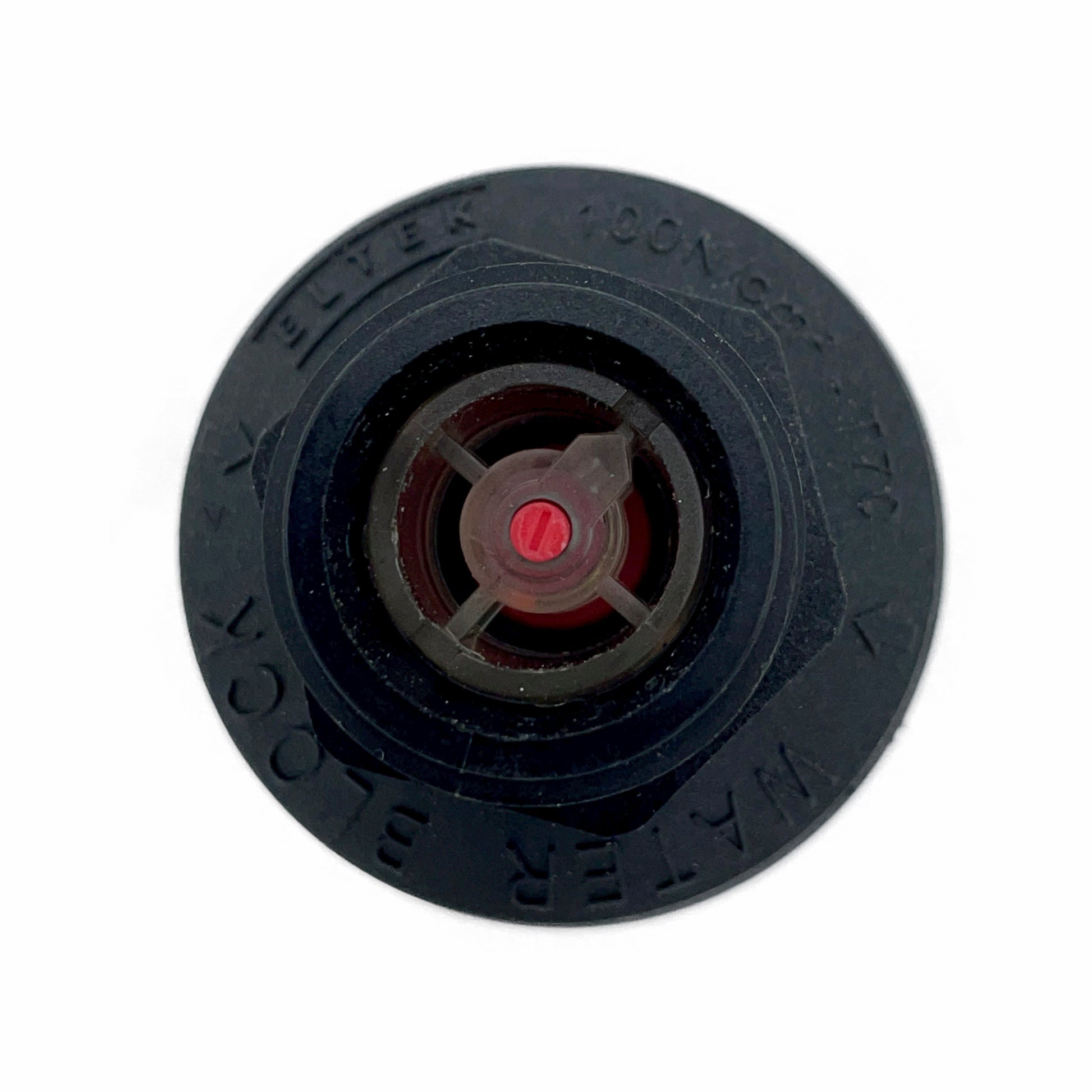 The settings dial on the Eltek mechanical Water Block. 10 setting notches with each setting being +1.3 gallons. Turn the dial clockwise to increase shutoff volume threshold or counter clockwise to lower the water volume shutoff threshold. The arrow indicates current setting. The red center pin is used to reset the device and resume flow.